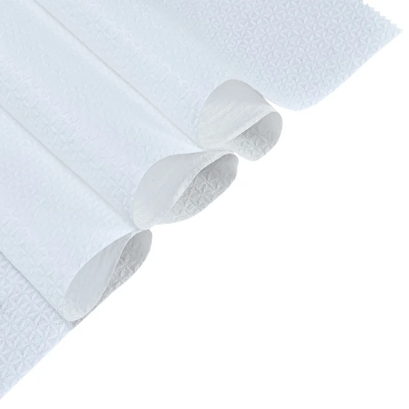 China Professional Embossed Snow Pattern 60-100Gsm Spunlace Nonwoven Fabric In Stock