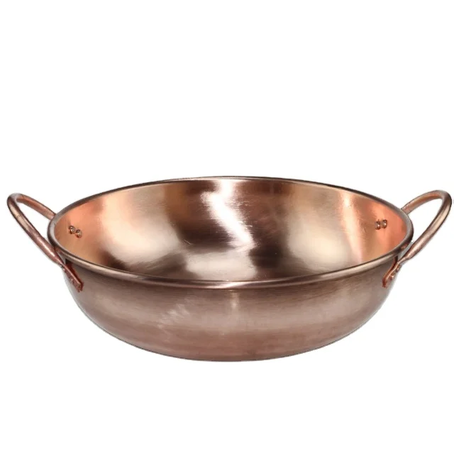Chinese traditional handmade copper pots and non stick pans use on home restaurant kitchen cooking