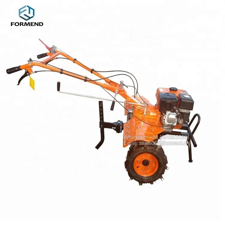 Small farm equipment motor cultivator with plough