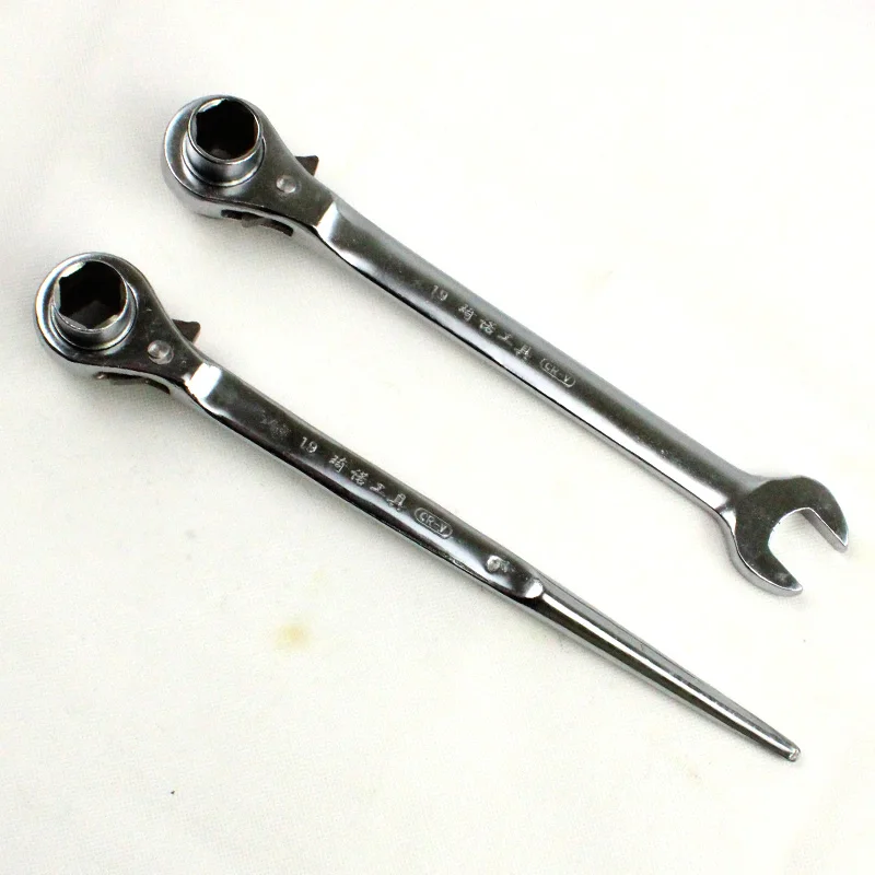 Construction worker removes the ratchet wrench at the tip end of the formwork wrench