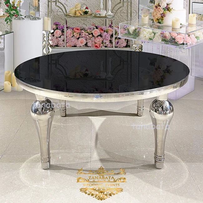 Wedding restaurant mirror glass top and silver leg dining table