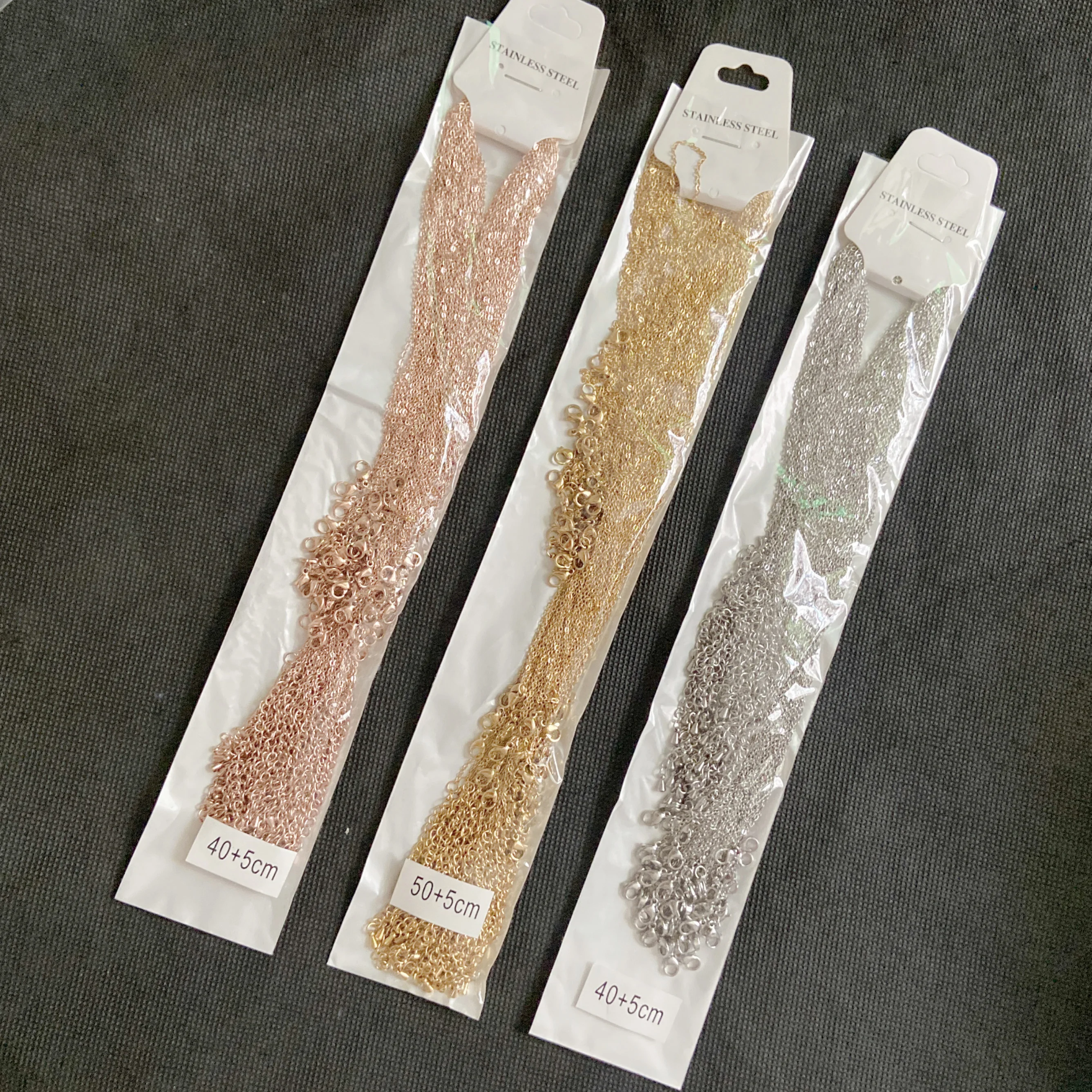 factory wholesale price no tarnish shinny diy jewelry water drip extension chain 1.5mm flat o cable chain bulk necklace