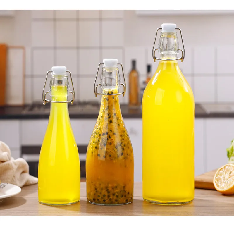 350ml 500ml 1000ml Wholesale Flip Top Transparent Amber Blue Beer Glass Bottle With Swing Caps