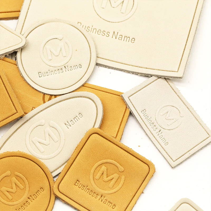 Best Price Custom Shape Embossed Brand Triangle Round Rectangle Clothing Tag Metal Casting Pu Leather Patches