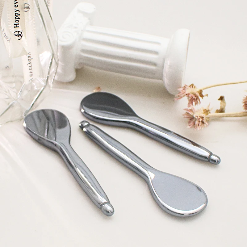 Free custom logo massager stick eyelid acupressure terahertz spoon gua sha facial tool