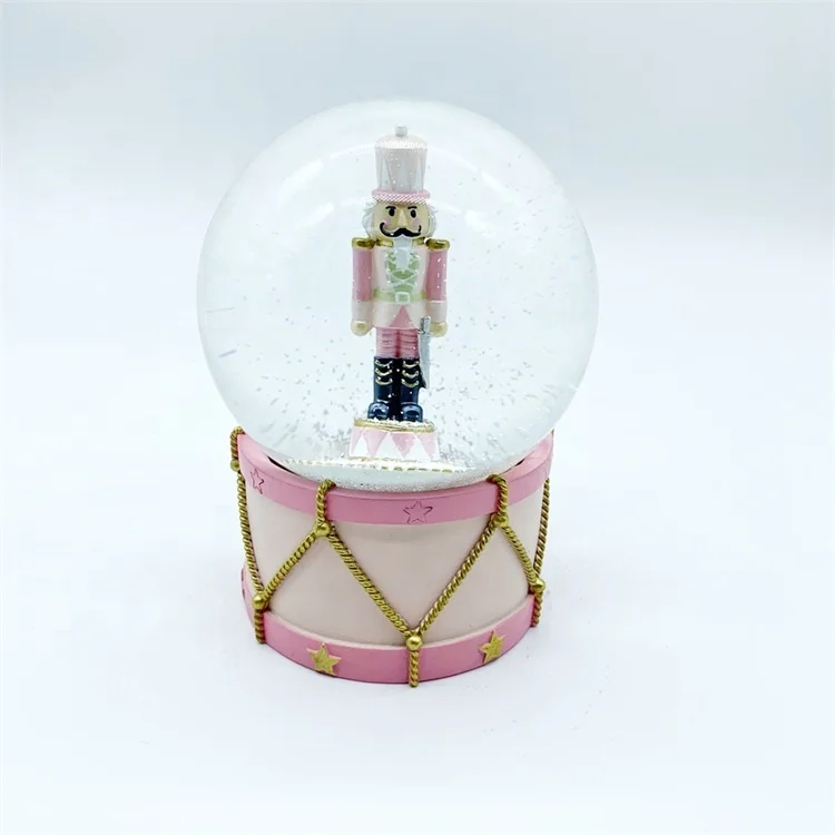 
online shopping Factory price 120MM resin Walnuts soldiers glass christmas snow globes with pink base 