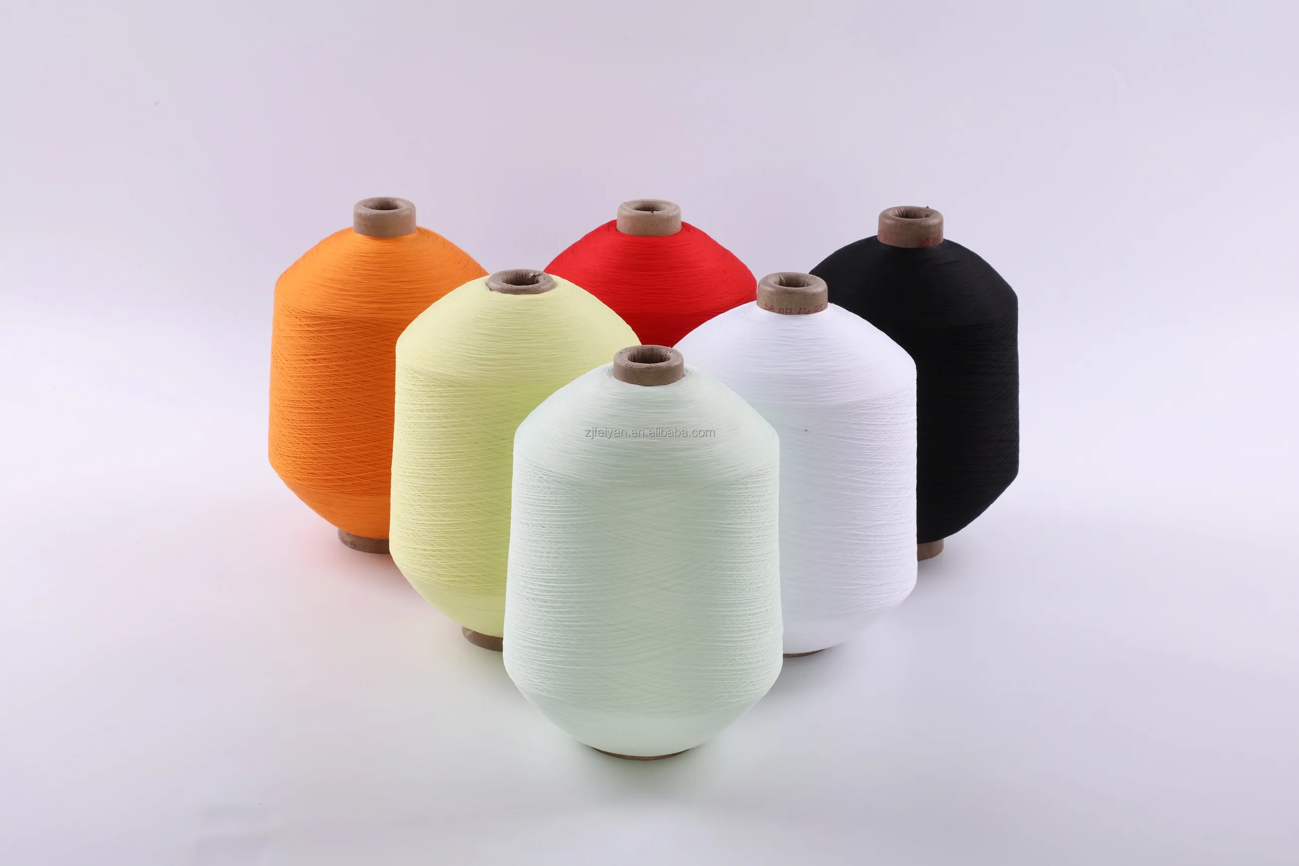 Widely used in the textile industry of various colors of high elasticity and comfort high stretch PES polyester yarn