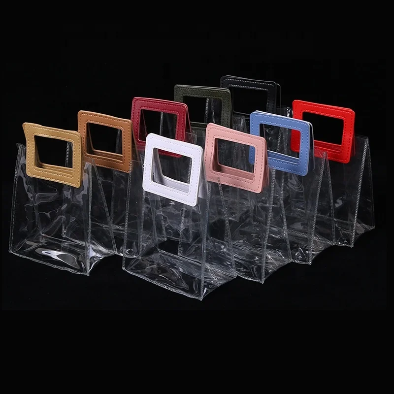 Wholesale hot sale transparent pvc hand bag waterproof beautiful clear plastic handbag tote shopping purse for woman with print