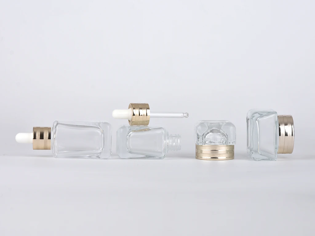 Luxury Cosmetic Container 30ml 50ml Makeup Set Square Shape Clear Glass Serum Bottles With Gold Dropper Cap