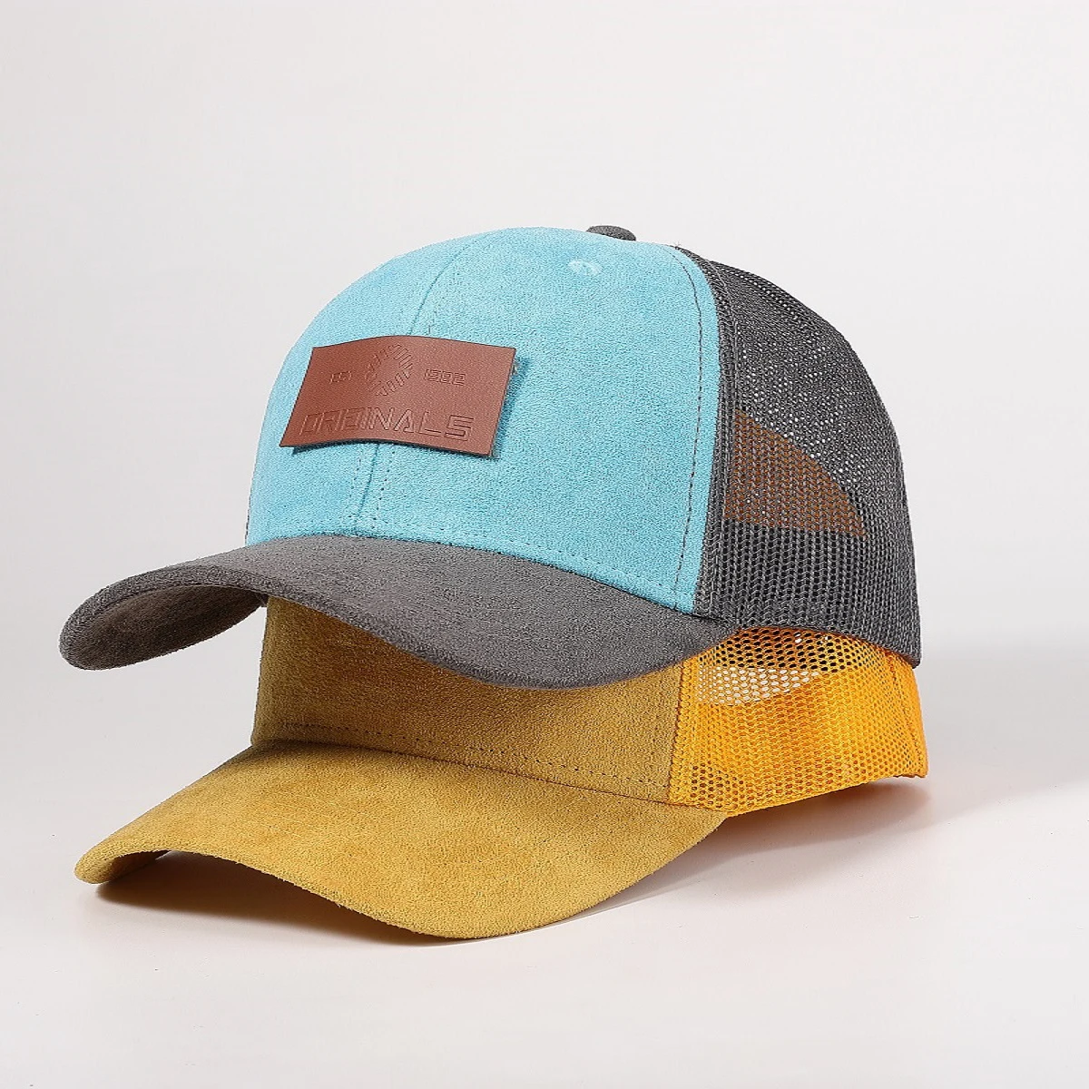 Guangzhou custom rubber patch lgo snapback trucker hats mesh