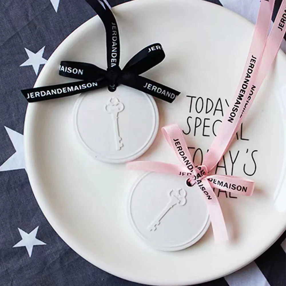 Wholesale round key shaped white scented ceramic aroma diffuser stone as gift set