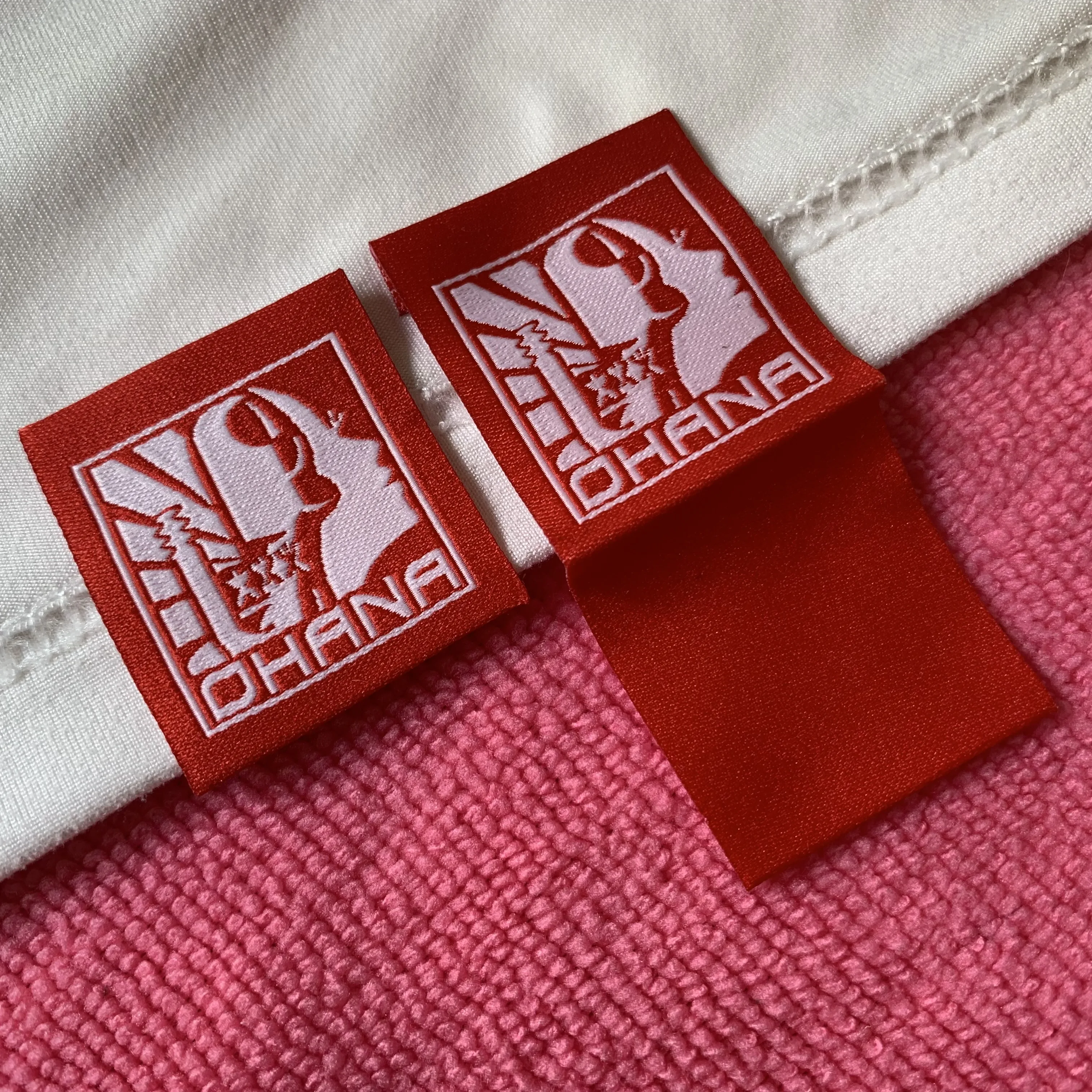 not itchy book cover fold weaving logo sleeve hem label,handmade company logo textile shirt hem tags