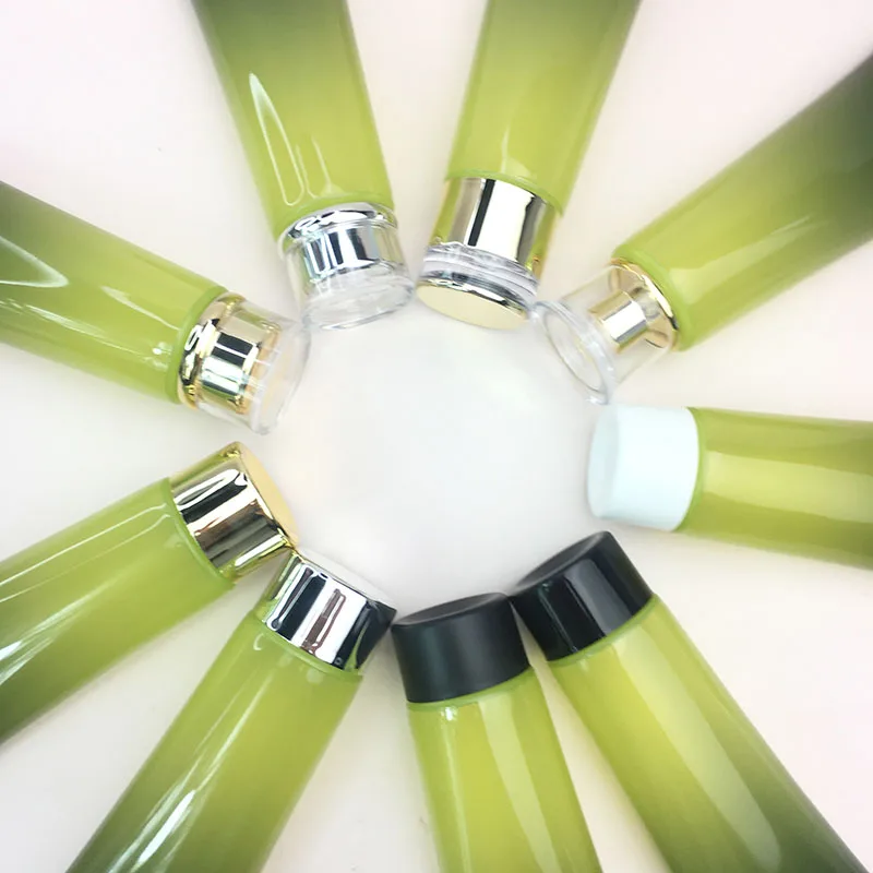 Green gradient empty plastic cosmetic packaging squeeze soft tube capacity 100 g and black outer packing carton are in stock