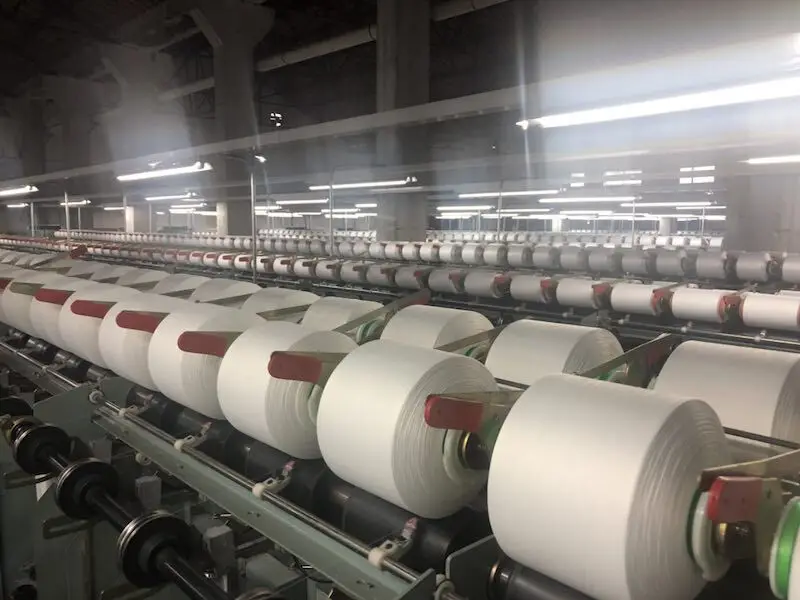 two for one twisting machine for filament yarn