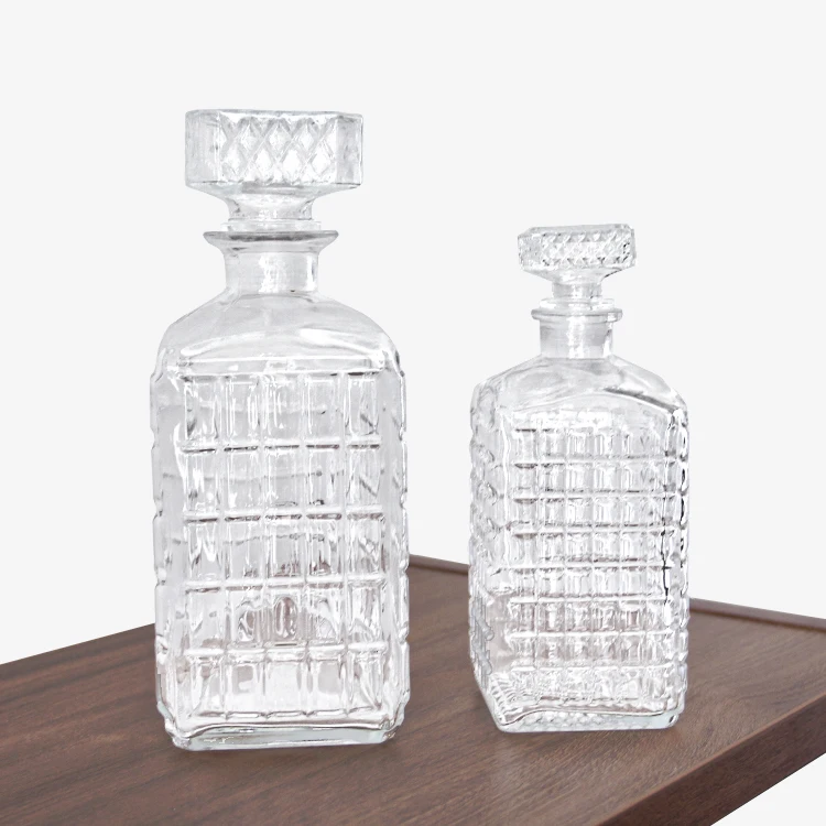 Embossed square 1000ml wine glass bottle glass spice honey jar packaging with glass lid with pp pad