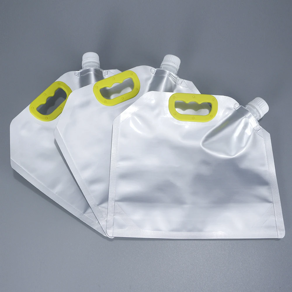 Wholesales stand up pouch plastic aluminum foil nozzle packaging bags with spout for water juice wine tea coffee packaging