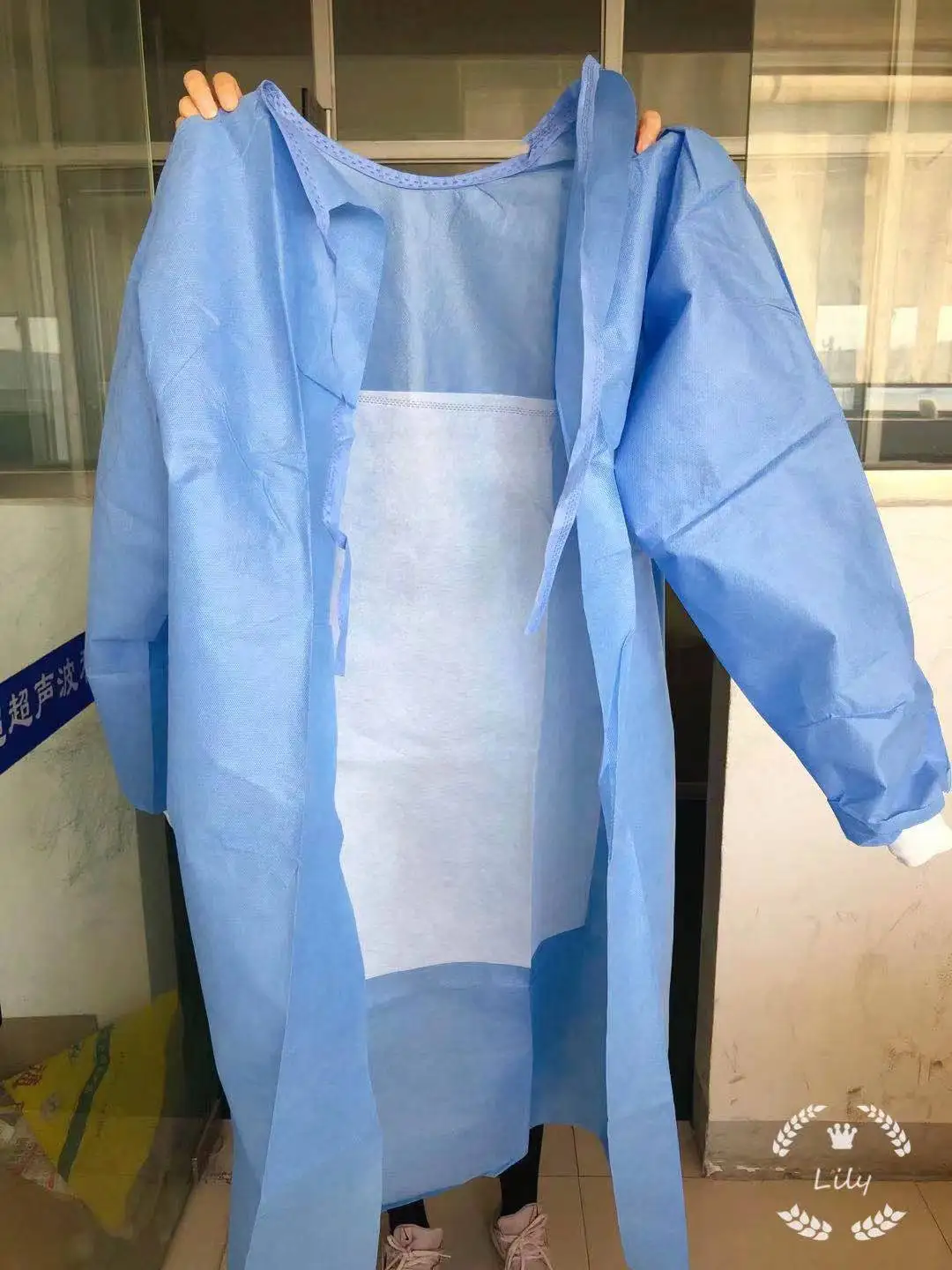 Surgical gown sewing machine