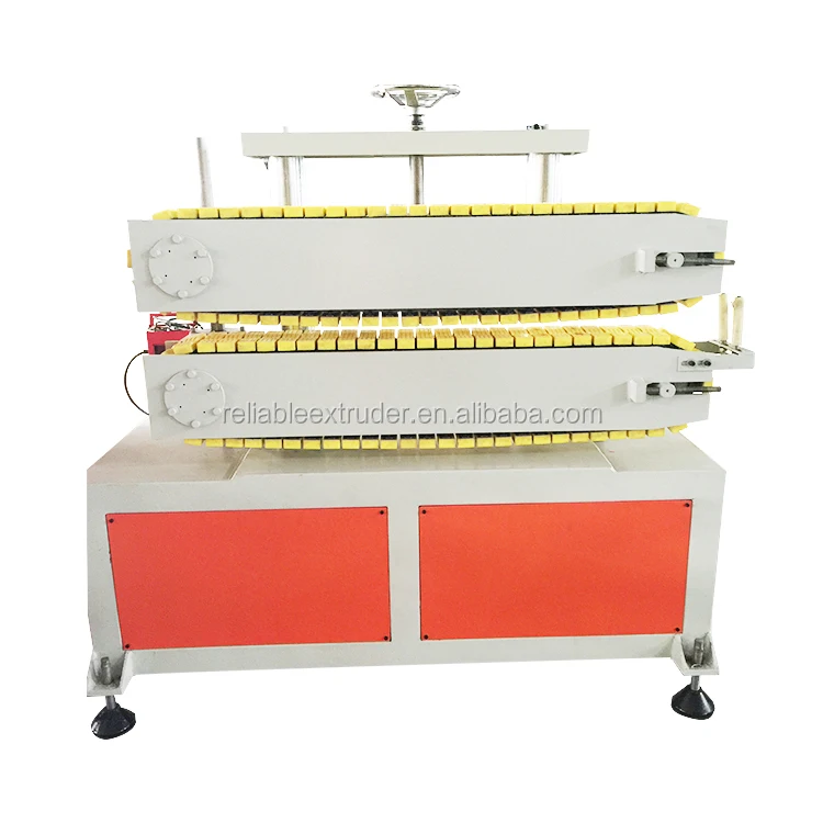 Тяговая машина с двумя гусеницами для пластиковых труб