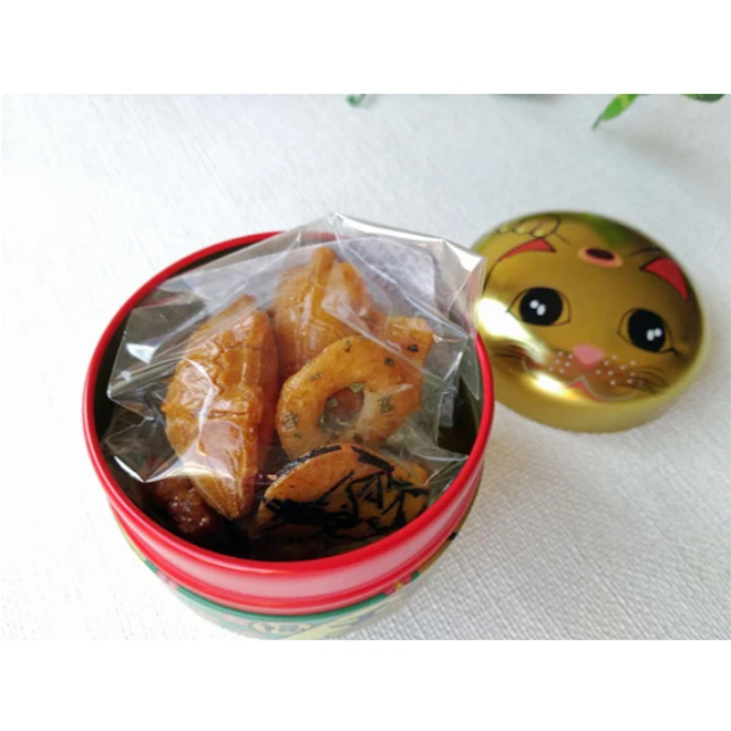 Maiko-san girl cute packaged chocolate candy or rice cracker in good fortune gold lucy cat and daruma can