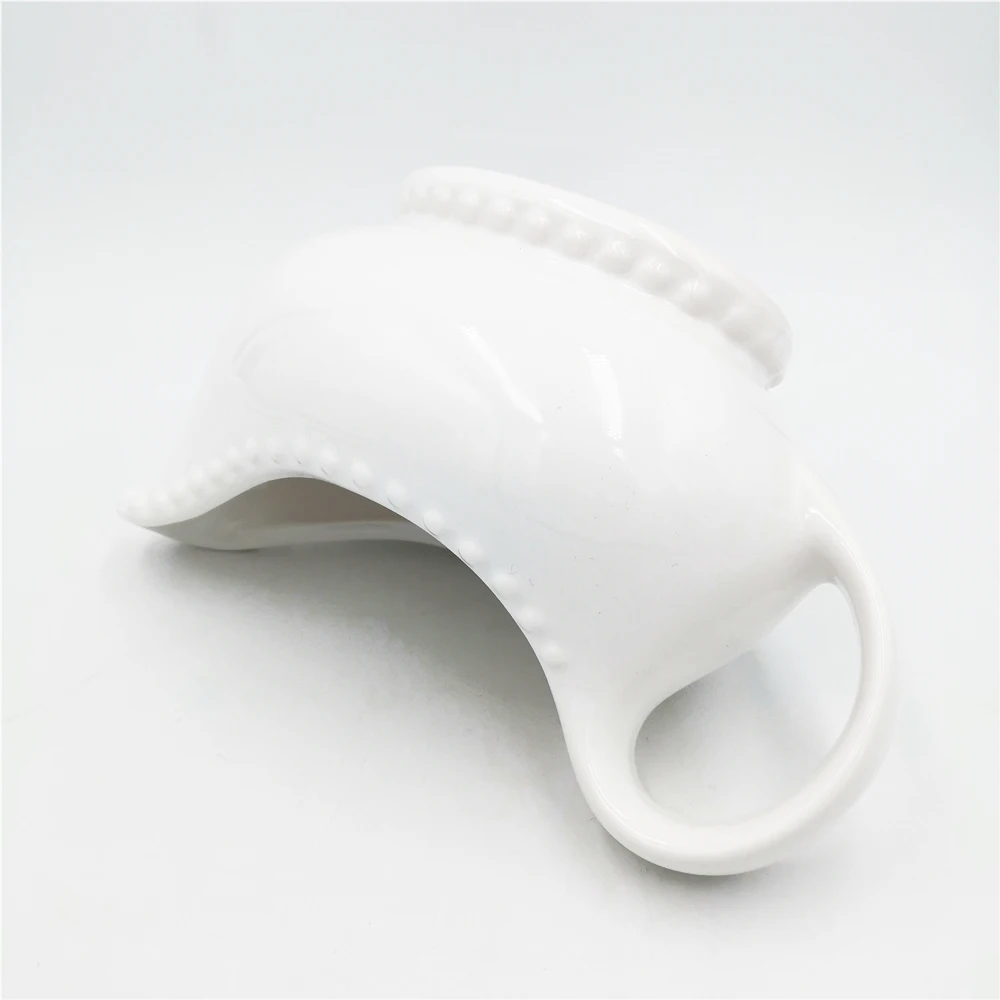 Wholesale cheap embossed dot White Easy-Pour Ceramic sauce Gravy Boat with