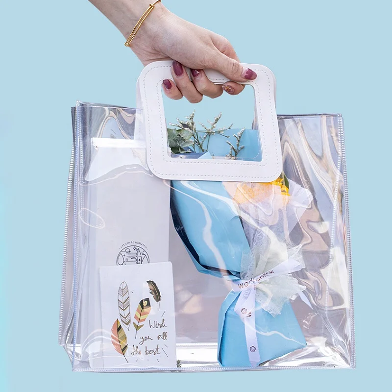 Wholesale hot sale transparent pvc hand bag waterproof beautiful clear plastic handbag tote shopping purse for woman with print