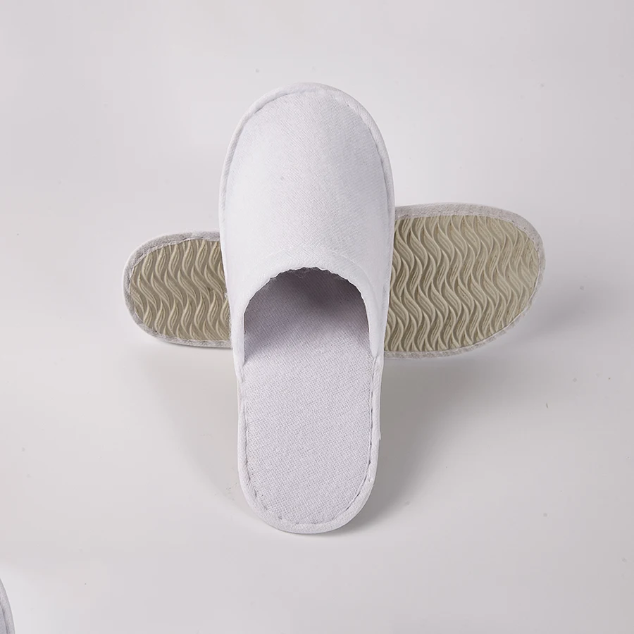 2023 hot selling custom logo anti slip sole terry towel upper hotel slippers white hotel disposable slippers