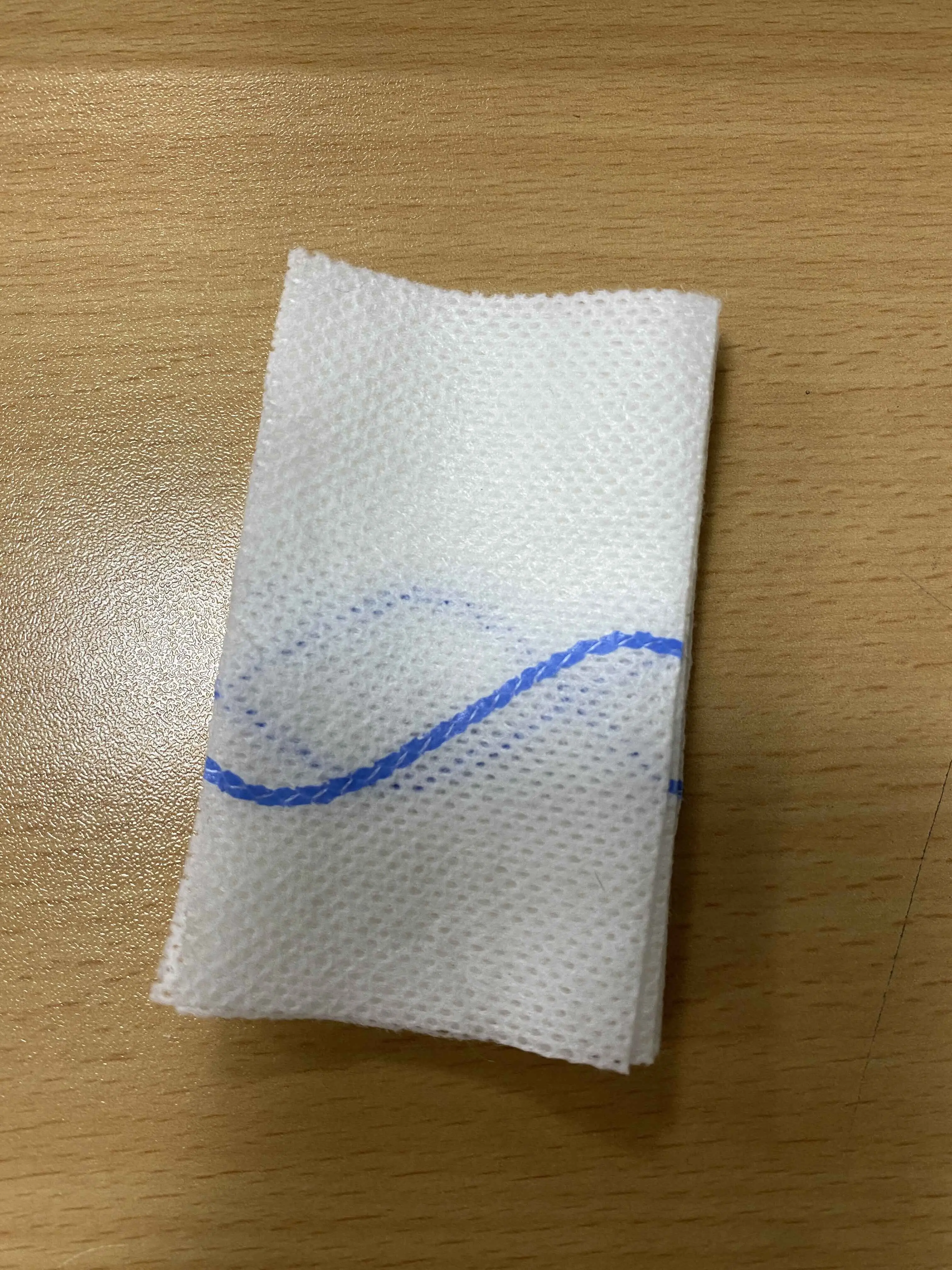 Z-folded gauze with coagulant factor