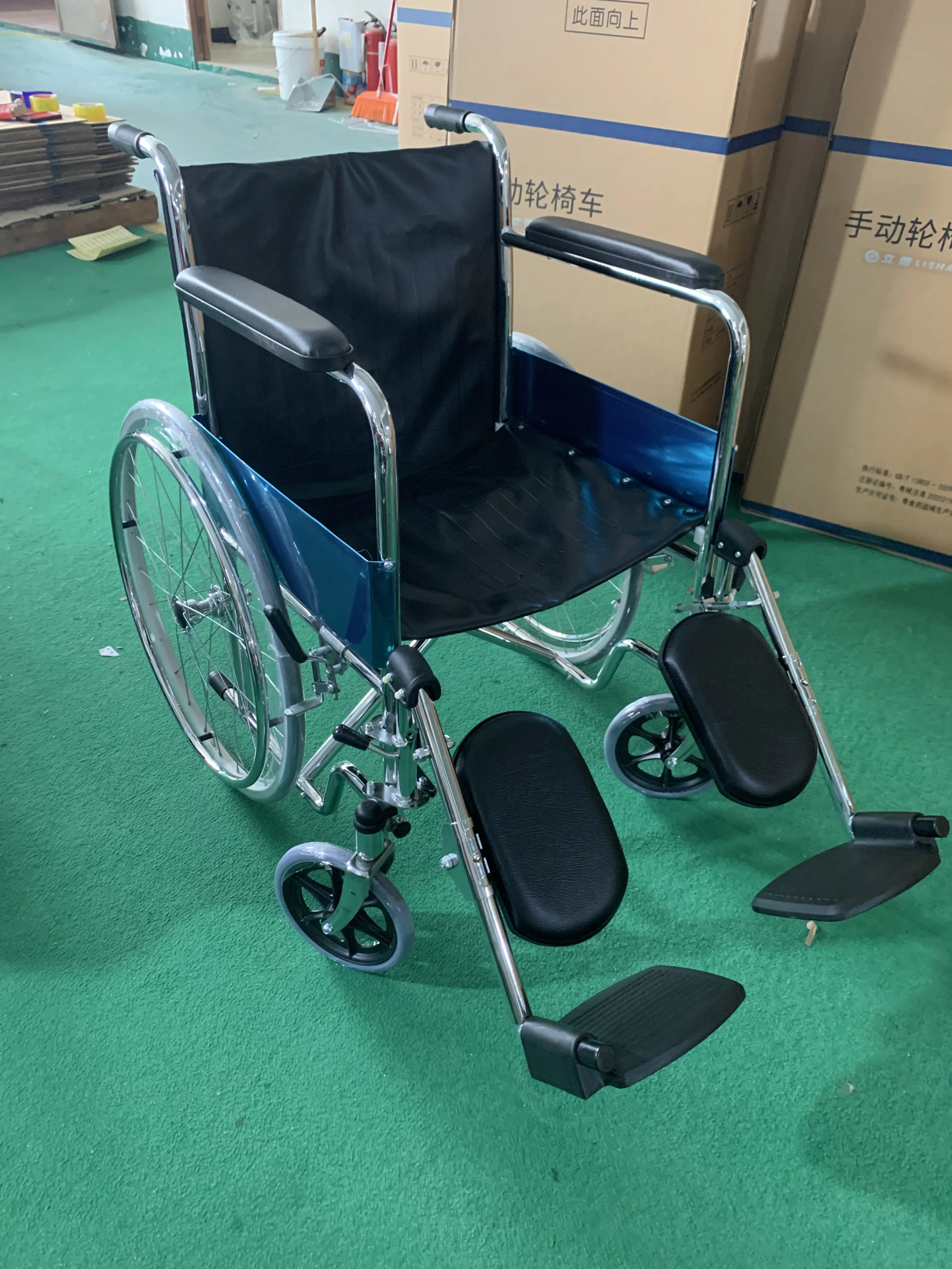 Cheap price comfortable economic manual wheelchair with elevating leg rest