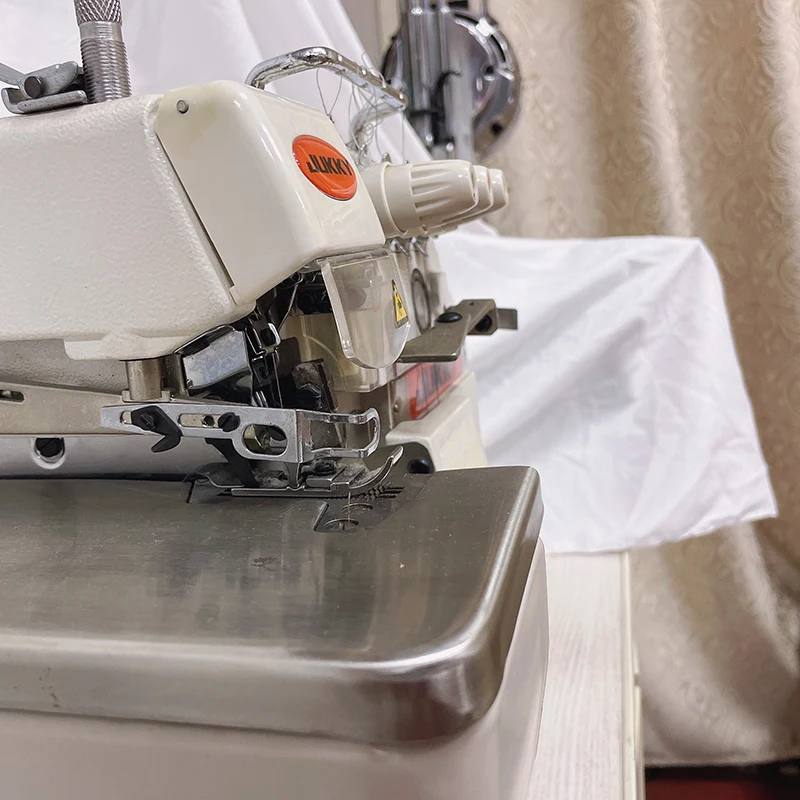 China Jukky Good Price Direct Drive Wiki Brand High Speed Four Thread Overlock Sewing Machine Suitable
