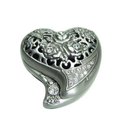 Heart-shaped metal rose jewelry box with diamonds