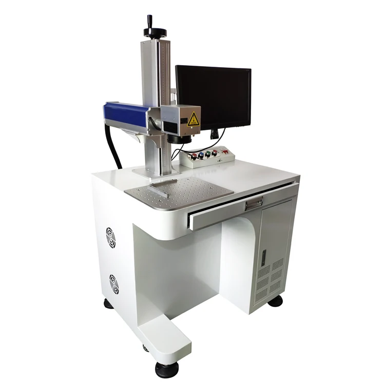 
sheet metal plastic labeling paper laser printing machine on baby pacifier 