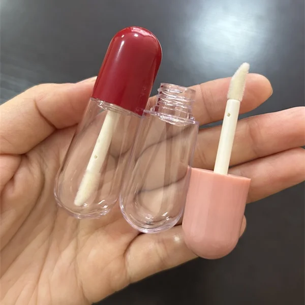 Hot sale pill shaped mini cute lipgloss tubes pink red custom logo empty lip gloss containers clear bottle with brush 4ml