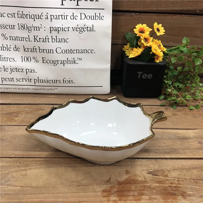 factory custom design leaf shape ceramic bowls with electroplate gold rim decoration for sale