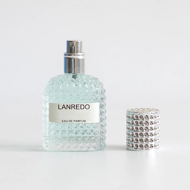 Fancy Embossed Crystal 100ml dubai Glass Perfume Bottles Empty Cosmetic Bottles With screw Spray