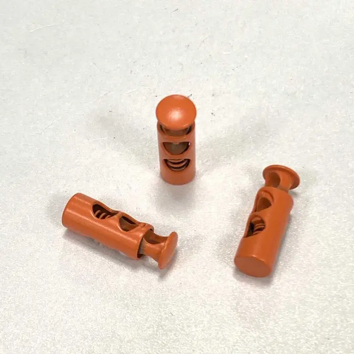 Manufacturers Custom Spring Press Cord Button Extension Cord Lock Stopper For Garment Backpack Accessories