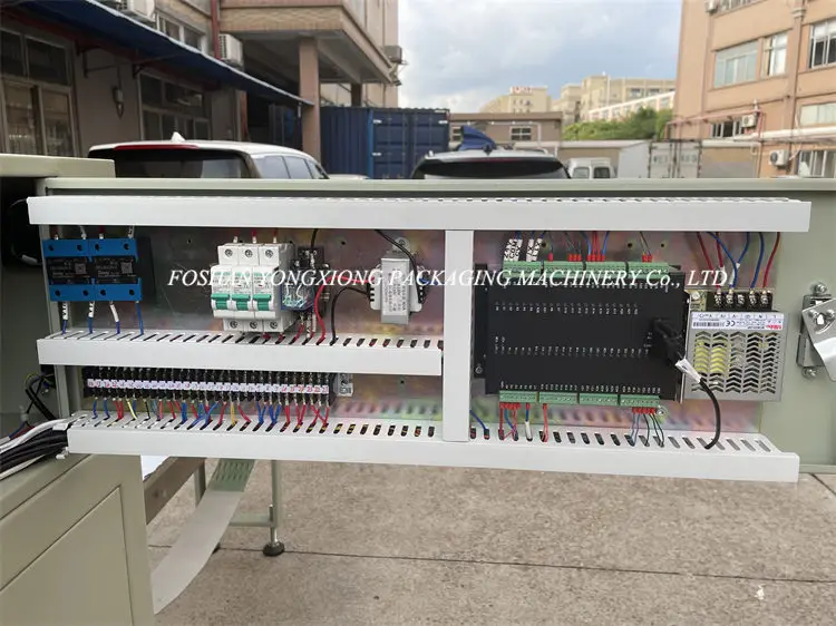 Yongxiong 2022 Automatic Chewy Oat Nut Granola Bars Packaging Machinery Candy Caramel Peanut Bar Packing Machine