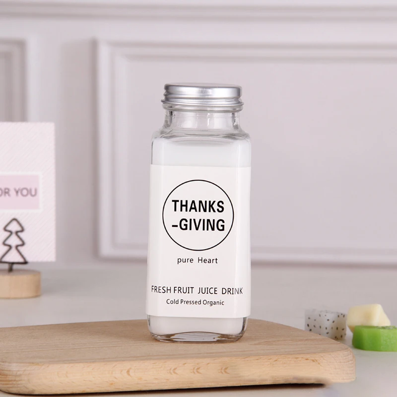 Custom Eco Friendly 250 Ml 350 Ml 500 Ml Clear French Square Clear Beverage Water Juice Glass Bottle With Lid