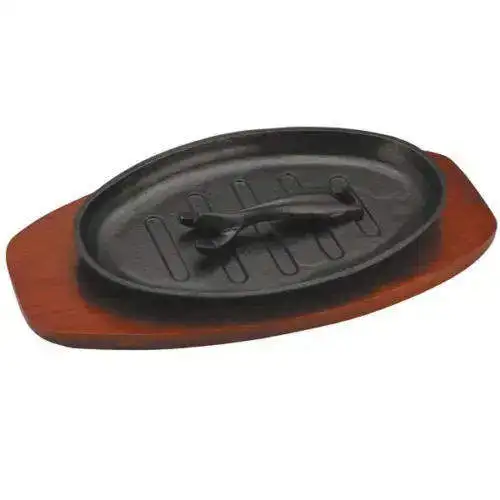 Cast iron vegetable oil oval fajita grill cast iron oval pan steak plate on board