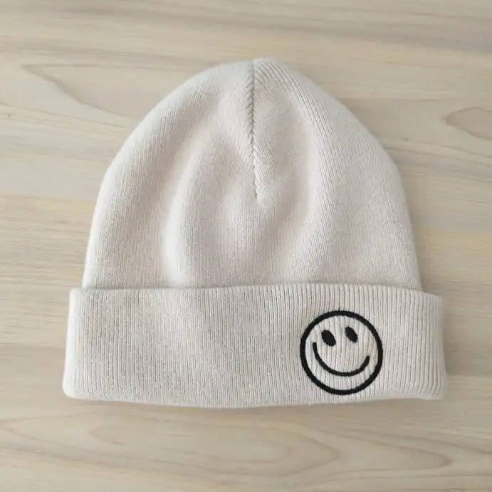 Beanies Knitted Beanie cotton double layer Beanie Hats Wholesale winter knitted hat with smile face embroidery.