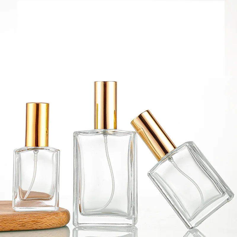 Luxury 30ml 50ml 100ml Clear Glass Perfume Atomizer Bottle Flat Shoulder Square Design with Fine Mist for Cosmetics