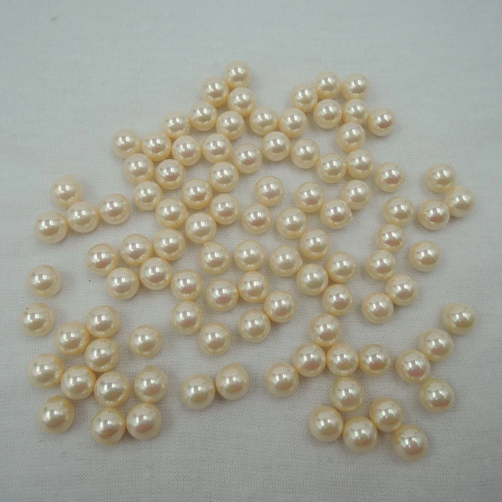 in paired 8mm mother of pearl ,sea-shell pearl ,perfect round shape,half hole drilled
