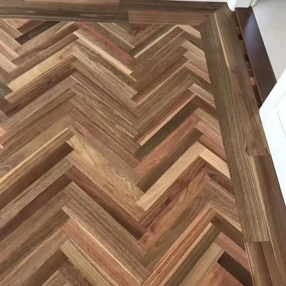 
walnut color solid spotted gum herringbone flooring 