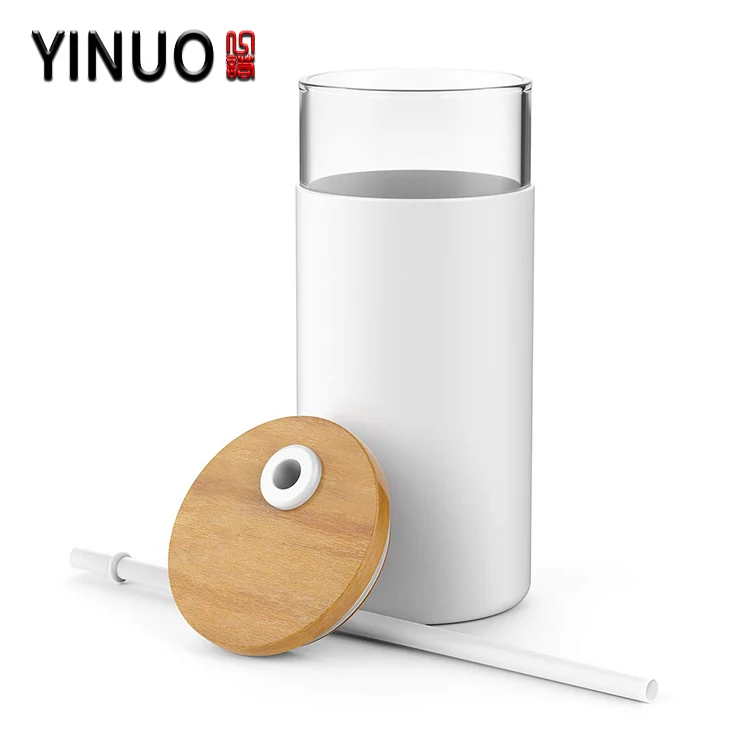 
Glass water tumbler bottle with bamboo lid and silicone sleeve 