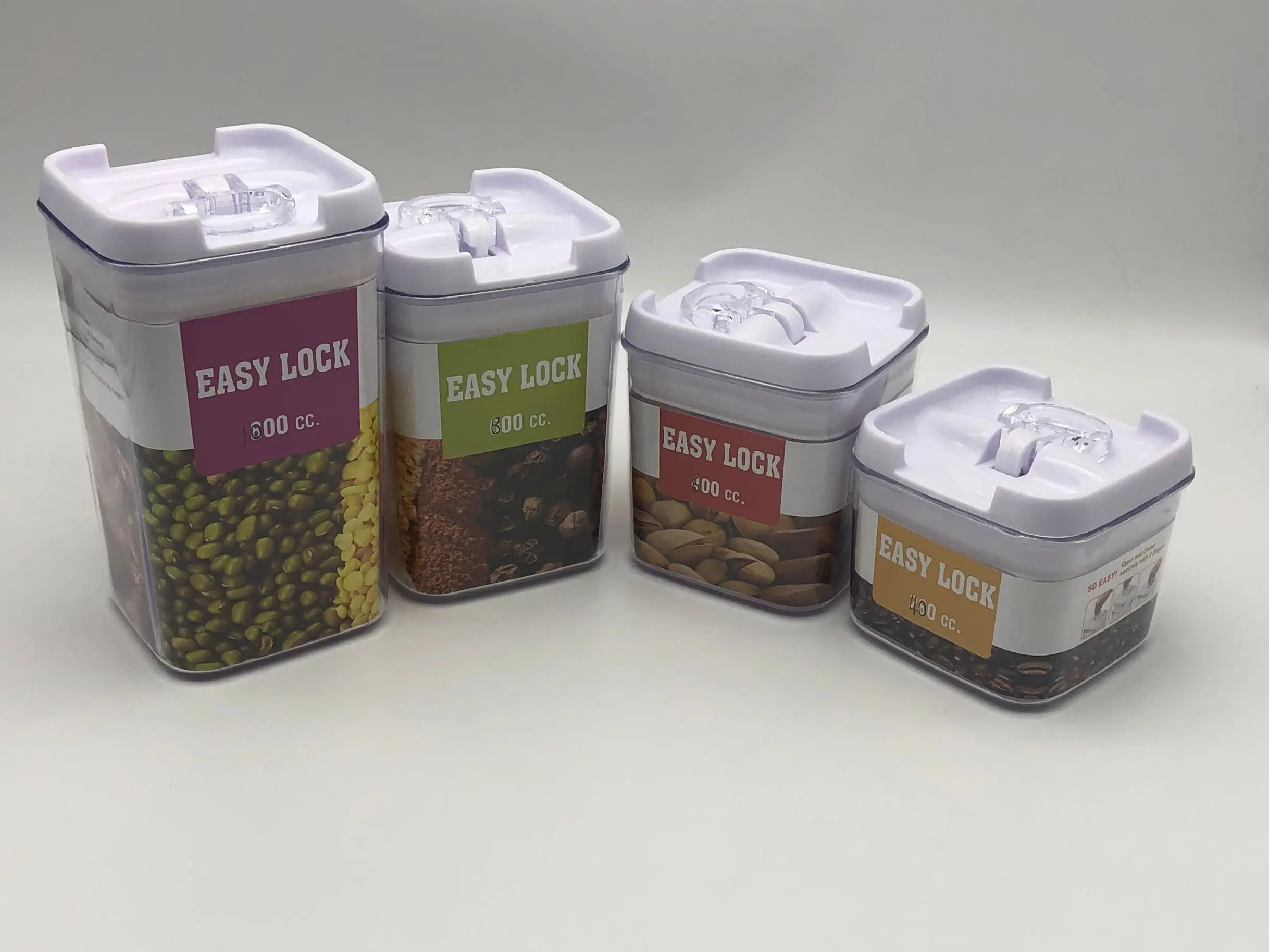 Set of 4 Plastic Canister Jars with Air Tight Lids for Kitchen or Bathroom Food Cookie Cracker Storage Containers