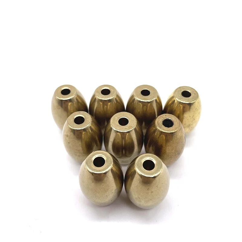 ufo brass sphere non standard customized brass ball drill hole elliptical steel ball