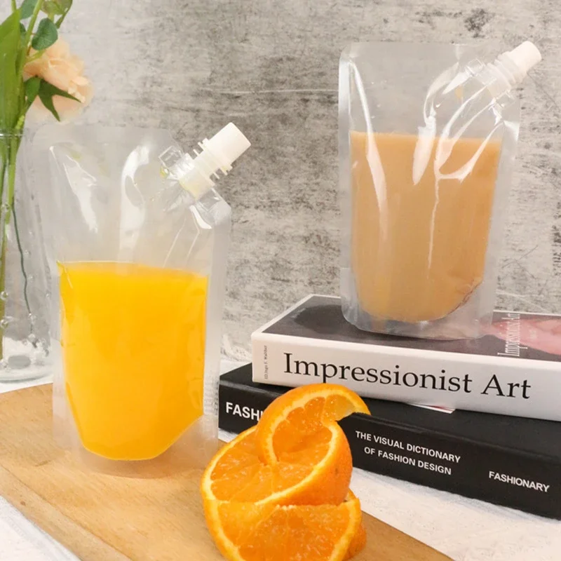 Wholesale Transparent Liquid Packaging Bags Drinking Plastic Juice Beverage Sealed Clear Stand Up Storage Pouches