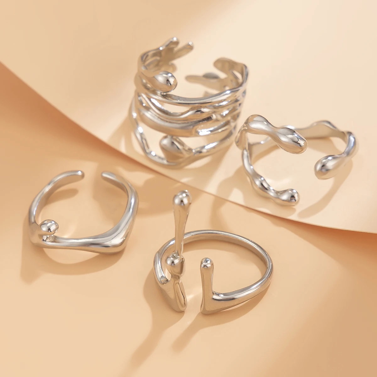 4 Pieces Irregular Designer Liquid Metal Rings Sets for Women Trendy Stackable Finger Rings on Hand Accessories Fashion Jewelry