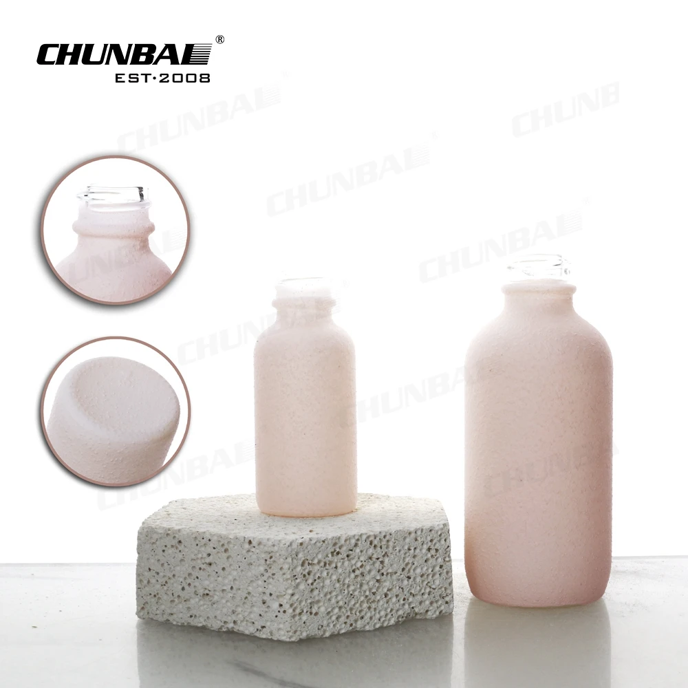 2022 New Arrival Frosted Recycled Unique Custom Trade Texture Thick Pink Round Shape Glass Luxury Cosmetics Bottle Packaging