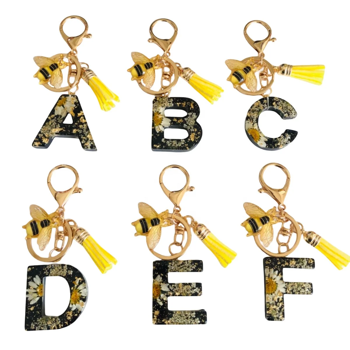Spot cross-border 26 letters drip key ring popular bee charm real dried flowers keychain car hanging bag accessories