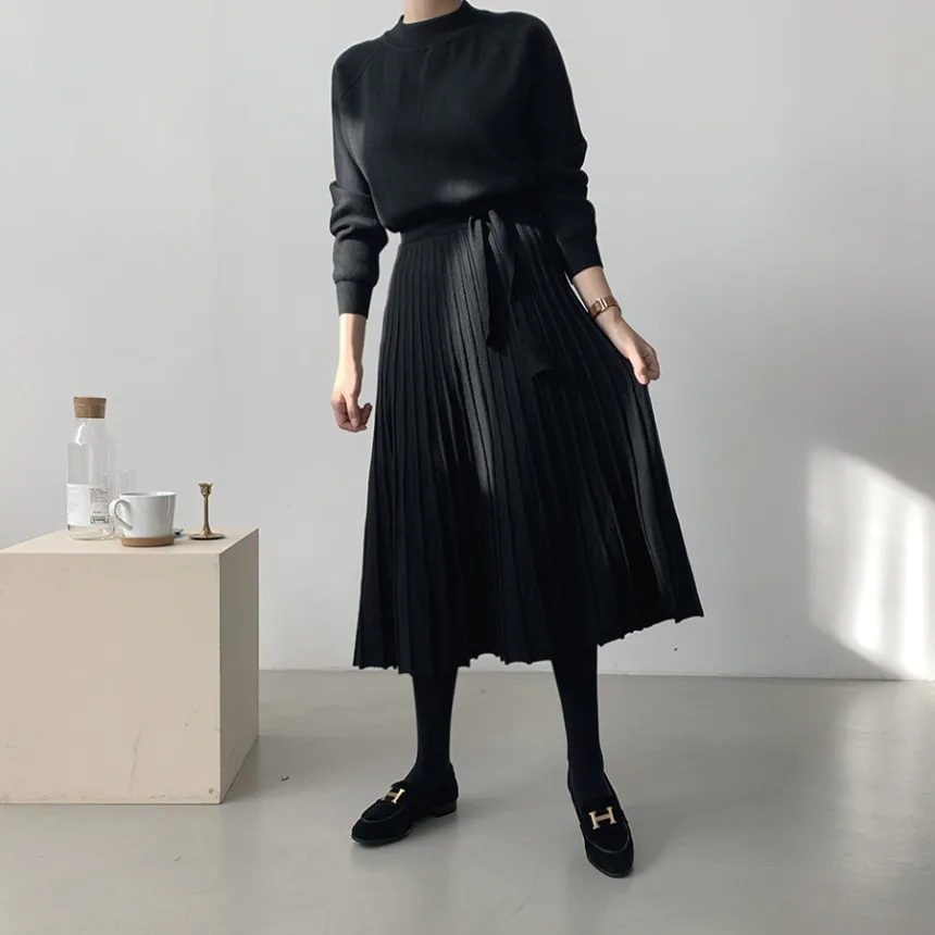 Korean version of autumn and winter new simple long thick knitted sweater solid color waist and thin with coat dress women